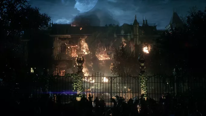 Wayne Manor on fire when Bruce fakes his death in Arkham Knight