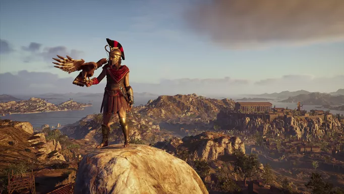 Kassandra from Assassin's Creed Origins, stood on a mountaintop as an eagle perches on her hand.
