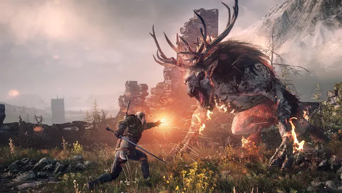 Gerald scrapping with a giant beast in The Witcher 3.