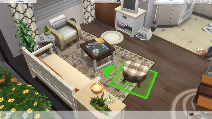 Screenshot showing a selected ottoman in The Sims 4 that has been rotated