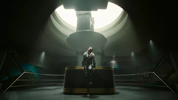 The protagonist of Cyberpunk 2077 stood at a desk in Phantom Liberty.